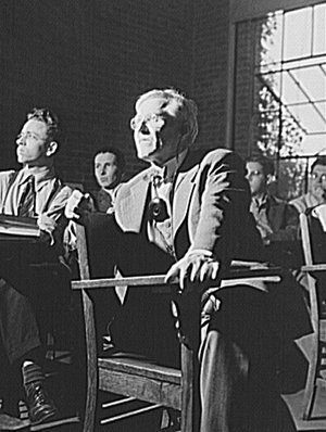 Orland Sweeney sitting in a classroom circa May 1942 by Jack Delano